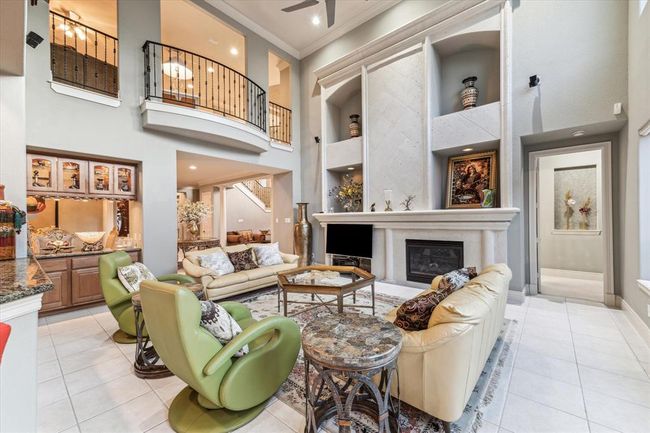 Showcase your art and your beloved pieces that you've collected over the years. Remote controlled fireplace. You will love relaxing in this space. | Image 9