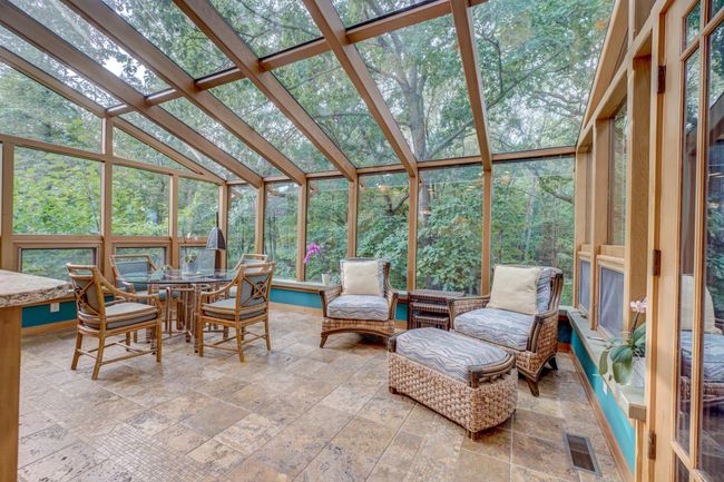 Off the kitchen is a great sun room perfect for taking in the four seasons | Image 13