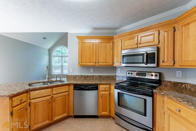 3650 Burnt Hickory Dr, House other with 4 bedrooms, 3 bathrooms and 2 parking in Dacula GA | Image 8