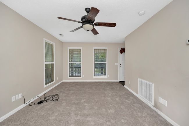 Living Room- carpet, ceiling fan | Image 7
