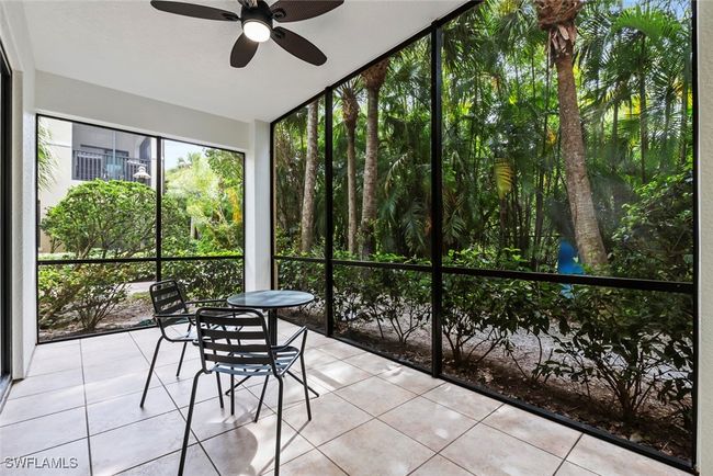 Unfurnished sunroom featuring ceiling fan | Image 13
