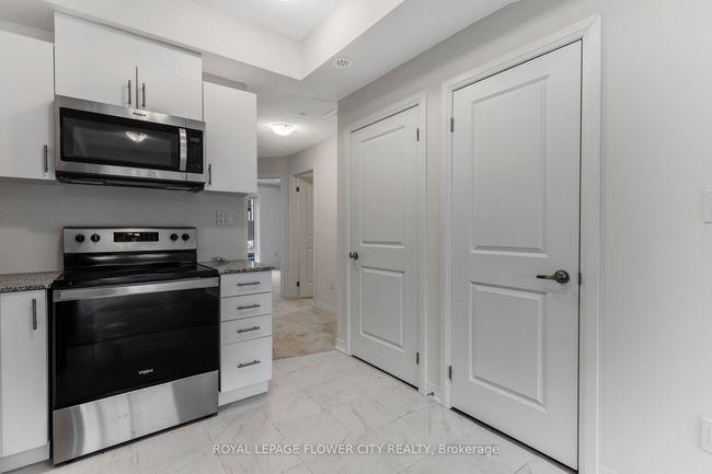 2 - 155 Tapscott Rd, Condo with 2 bedrooms, 1 bathrooms and null parking in Toronto ON | Image 18