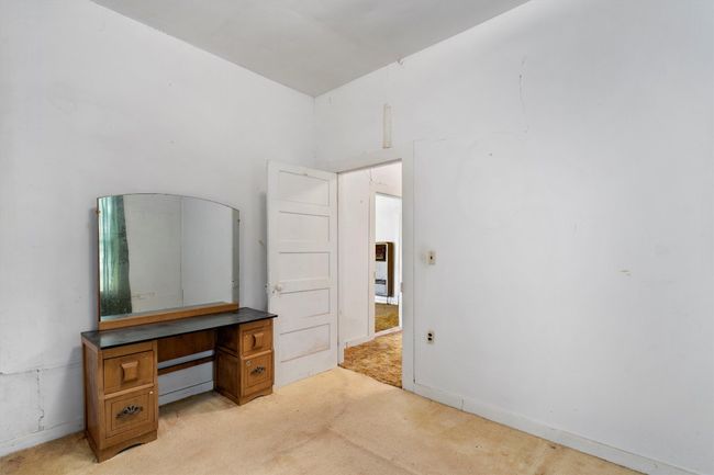 Bedroom with light carpet | Image 16