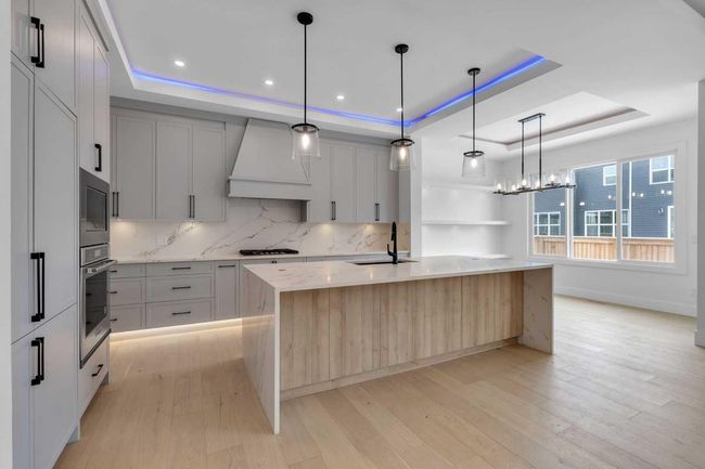 223 Kinniburgh Loop, House other with 4 bedrooms, 4 bathrooms and 5 parking in Chestermere AB | Image 16