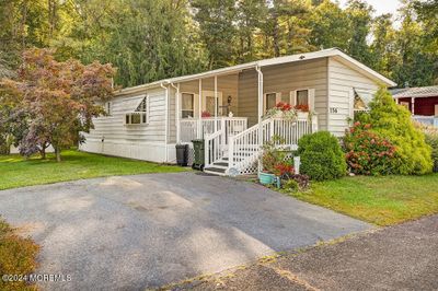 156 Village Road, House other with 2 bedrooms, 2 bathrooms and null parking in Morganville NJ | Image 1