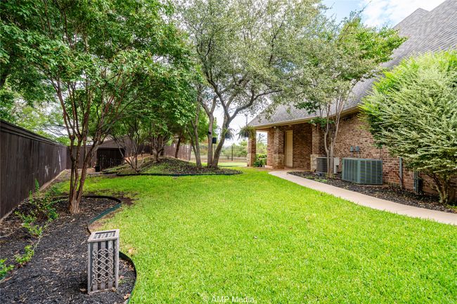 View of yard with central AC | Image 35