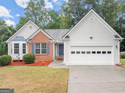 2979 Merrion Park Lane, House other with 7 bedrooms, 3 bathrooms and 2 parking in Dacula GA | Image 1