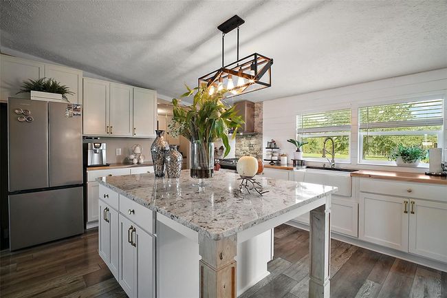 8507 Strawberry Fields Ct, House other with 4 bedrooms, 2 bathrooms and null parking in HOWEY IN THE HILLS FL | Image 16