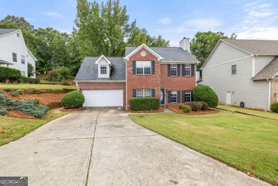 3990 Riversong Drive, House other with 3 bedrooms, 2 bathrooms and null parking in Suwanee GA | Image 1