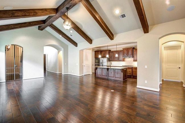 Living Dining Kitchen Combo with Wine Bar with Metal gate | Image 5