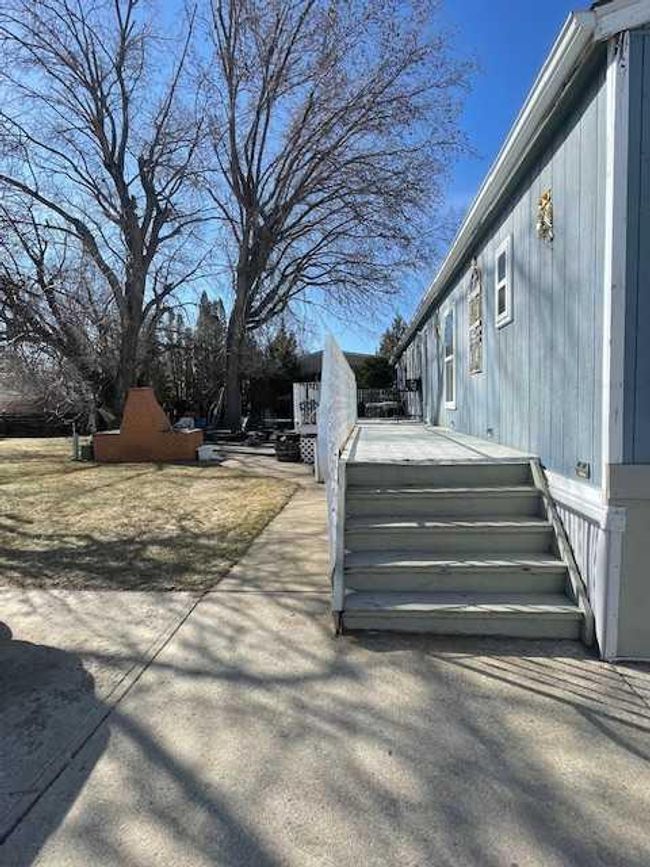 648 1 Street W, Home with 3 bedrooms, 2 bathrooms and 4 parking in Brooks AB | Image 12