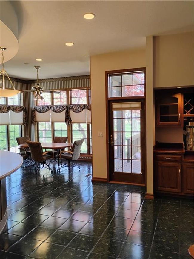 Kitchen with doorway leading to back deck | Image 30