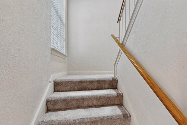 Staircase with a textured wall | Image 23