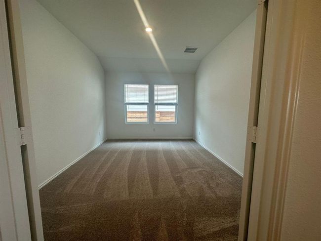 Spare room with carpet flooring and baseboards | Image 7