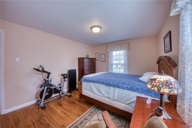 Bedroom with hardwood floors | Image 19