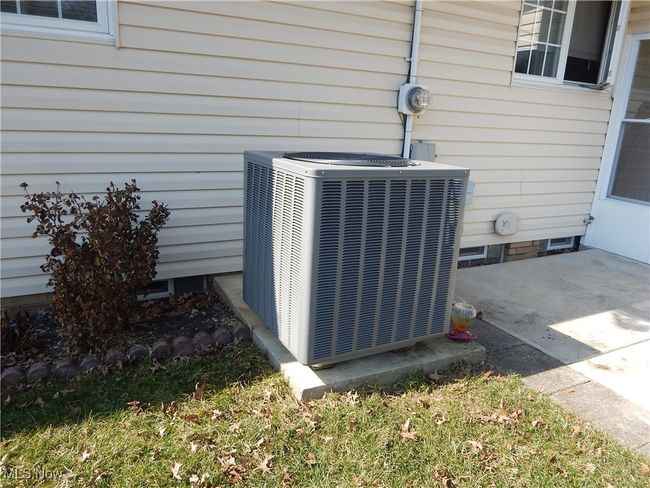 Exterior details featuring central AC unit. | Image 39