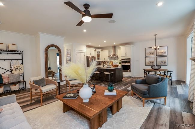 VIRTUAL STAGING. Photo represents the plan with virtual staging. Spacious and open family room. | Image 10