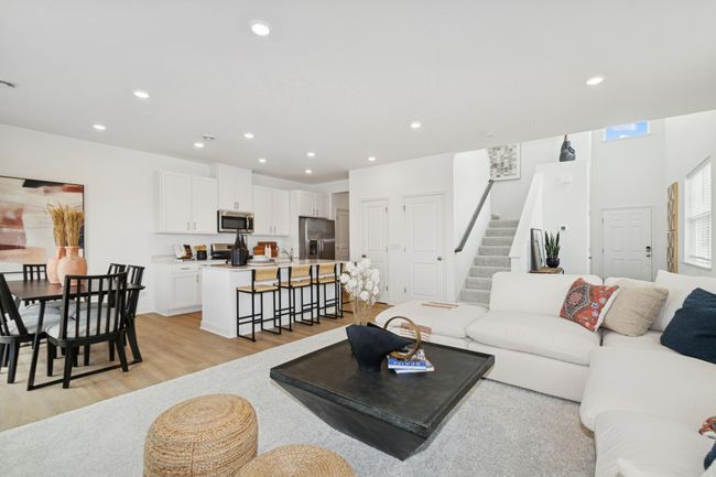 (Photo of model home, features will vary) This Great Room is framed by windows to bathe the space in natural light | Image 7