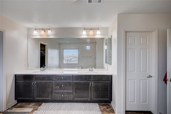 Full bath featuring Double Vanity, Sinks | Image 25