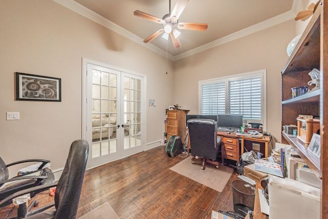 Office featuring french doors, crown molding, ceiling fan, and wood finished floors | Image 10