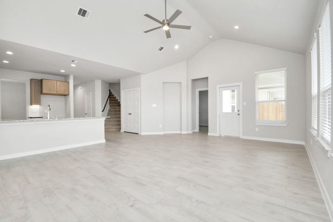 Discover another perspective of the open concept that unites the family room with the kitchen area! | Image 21