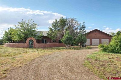 10379 & 10371 Road 36.7, House other with 5 bedrooms, 2 bathrooms and null parking in Mancos CO | Image 3