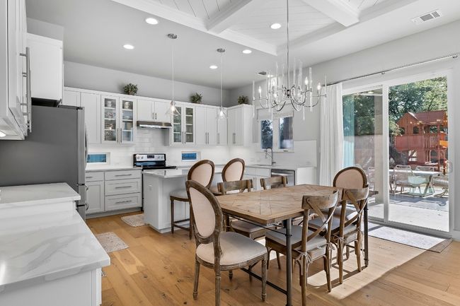 Facing kitchen and access to backyard | Image 5