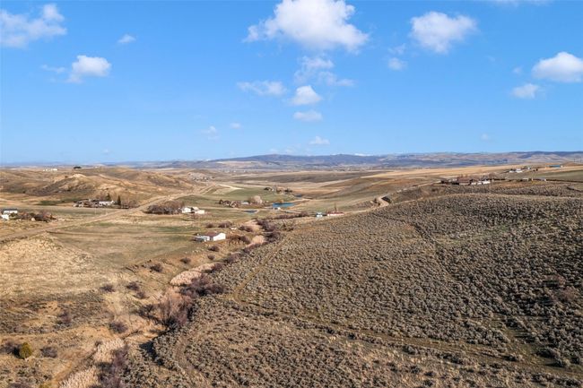 View of mountain backdrop featuring rural landscape | Image 24