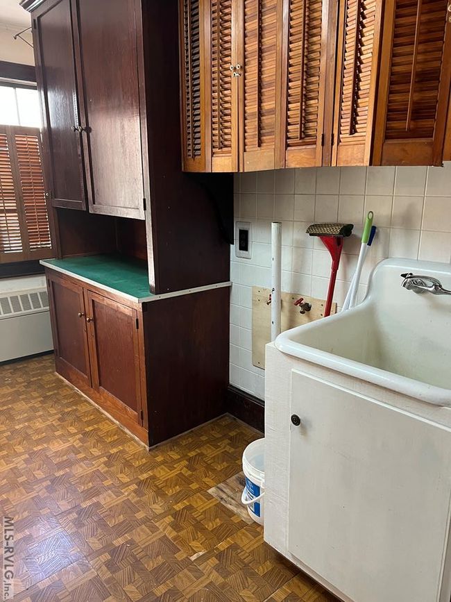 Laundry Room With Old Farm Sink | Image 33