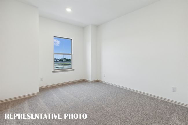 You'll find a nicely sized secondary bedroom in our Boyd floor plan. REPRESENTATIVE PHOTO | Image 15