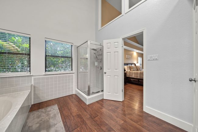 Primary bath walk in shower and Jacuzzi tub | Image 23