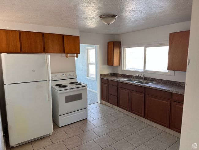 154 E Harris St, Home with 4 bedrooms, 2 bathrooms and 6 parking in Ogden UT | Image 7