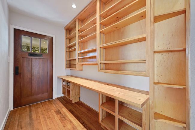 Unfurnished office featuring hardwood / wood-style floors and baseboards | Image 4