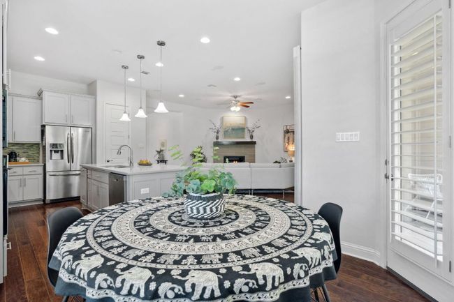 Access to the patio is found near the kitchen and casual dining, making grilling a breeze. | Image 18
