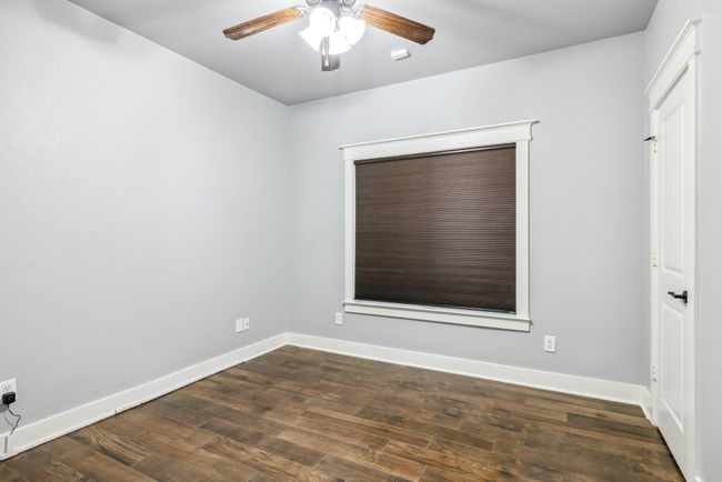 Downstairs bedroom connected to the full bath | Image 20