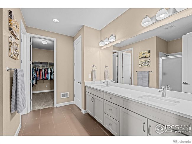 Primary suite with double sinks | Image 15