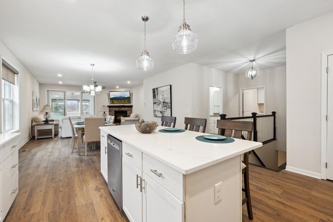 Open concept kitchen with a spacious island. | Image 8
