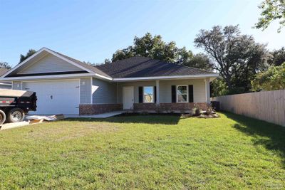 2136 Chapparal St, House other with 4 bedrooms, 2 bathrooms and 2 parking in Navarre FL | Image 2