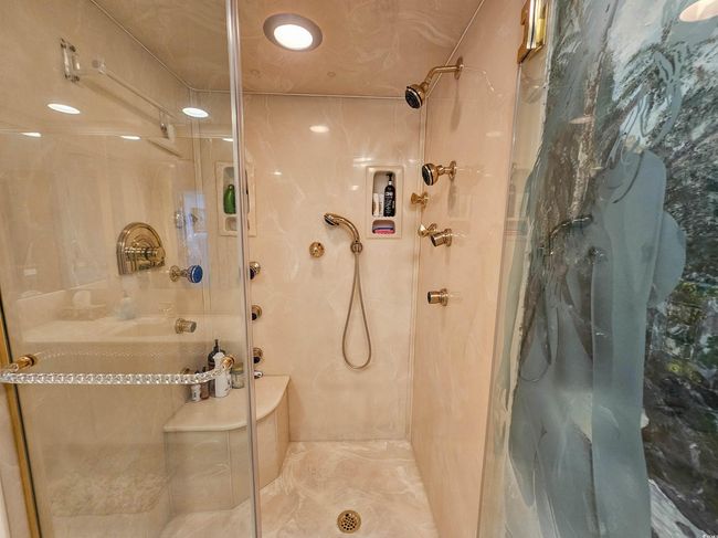 Bathroom featuring a shower stall | Image 35