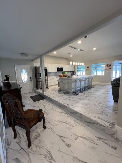 310 S 3rd St, HAINES CITY, FL, 33844-5122 | Card Image