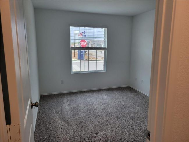 Empty room with carpet floors | Image 32
