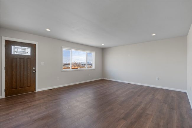 Entrance foyer with dark wood-style floors, visible vents, recessed lighting, and baseboards | Image 30