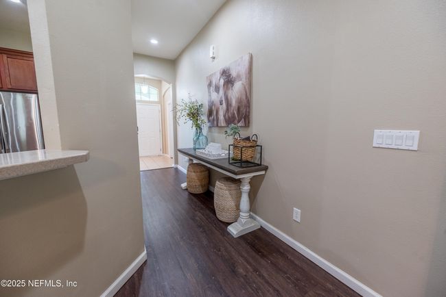 11760 Huckleberry Trl E, House other with 4 bedrooms, 2 bathrooms and null parking in MACCLENNY FL | Image 5