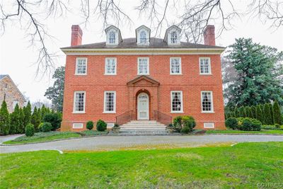 Built in 1986 by well know Richmond Custom Builder John L Stinson, Jr. for the current owner, this home closely replicates the architectural details of America's Era of Grand Manor Homes. An addition and subsequent renovation have updated the systems and design to facilitate today's lifestyle. Thoughtfully designed, artfully executed and impeccably maintained, this is one of Richmond's finest homes. LOVE WHERE YOU LIVE! | Image 1