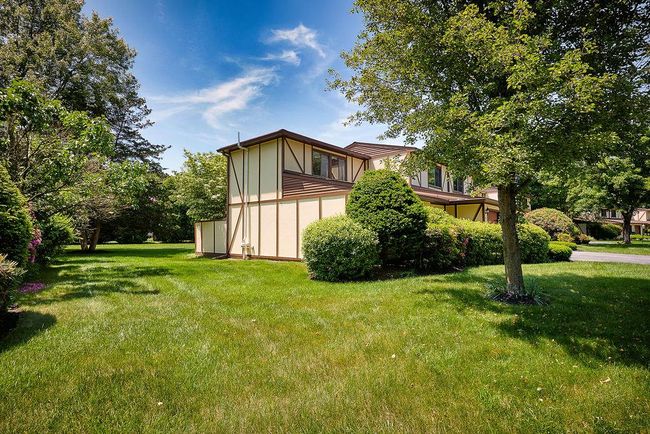 View of side of home featuring a lawn | Image 29