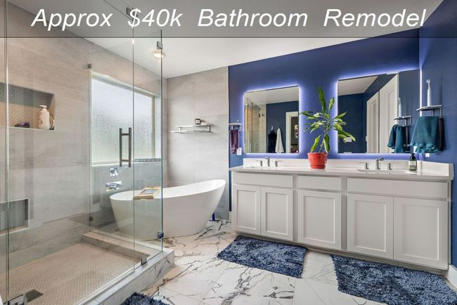 Full bathroom featuring double vanity, a shower stall, a soaking tub, and marble look tiles | Image 15