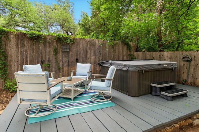 Includes fantastic deck to unwind on each day in a hot tub soak. | Image 22