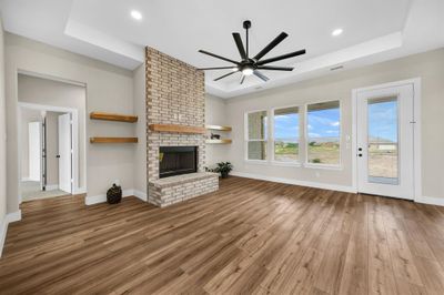 Tons of natural light flood this open living room. | Image 2