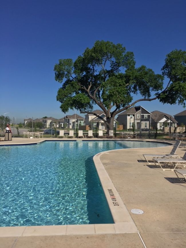 Community pool featuring fence and a patio | Image 34