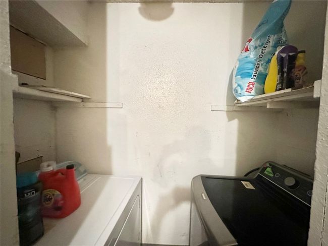 Laundry room with independent washer and dryer | Image 36